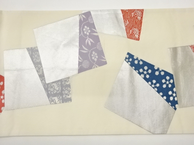  色紙に古典柄模様織出し袋帯